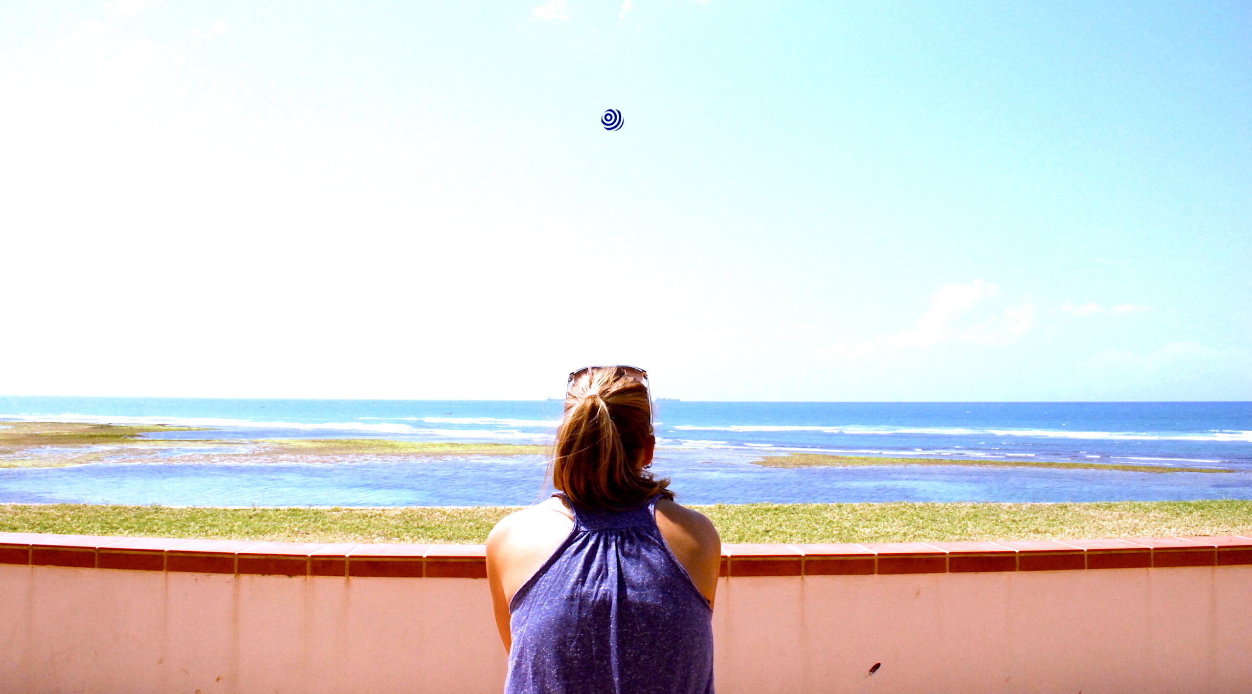 Me looking out towards the horizon by the beach in Tanzania