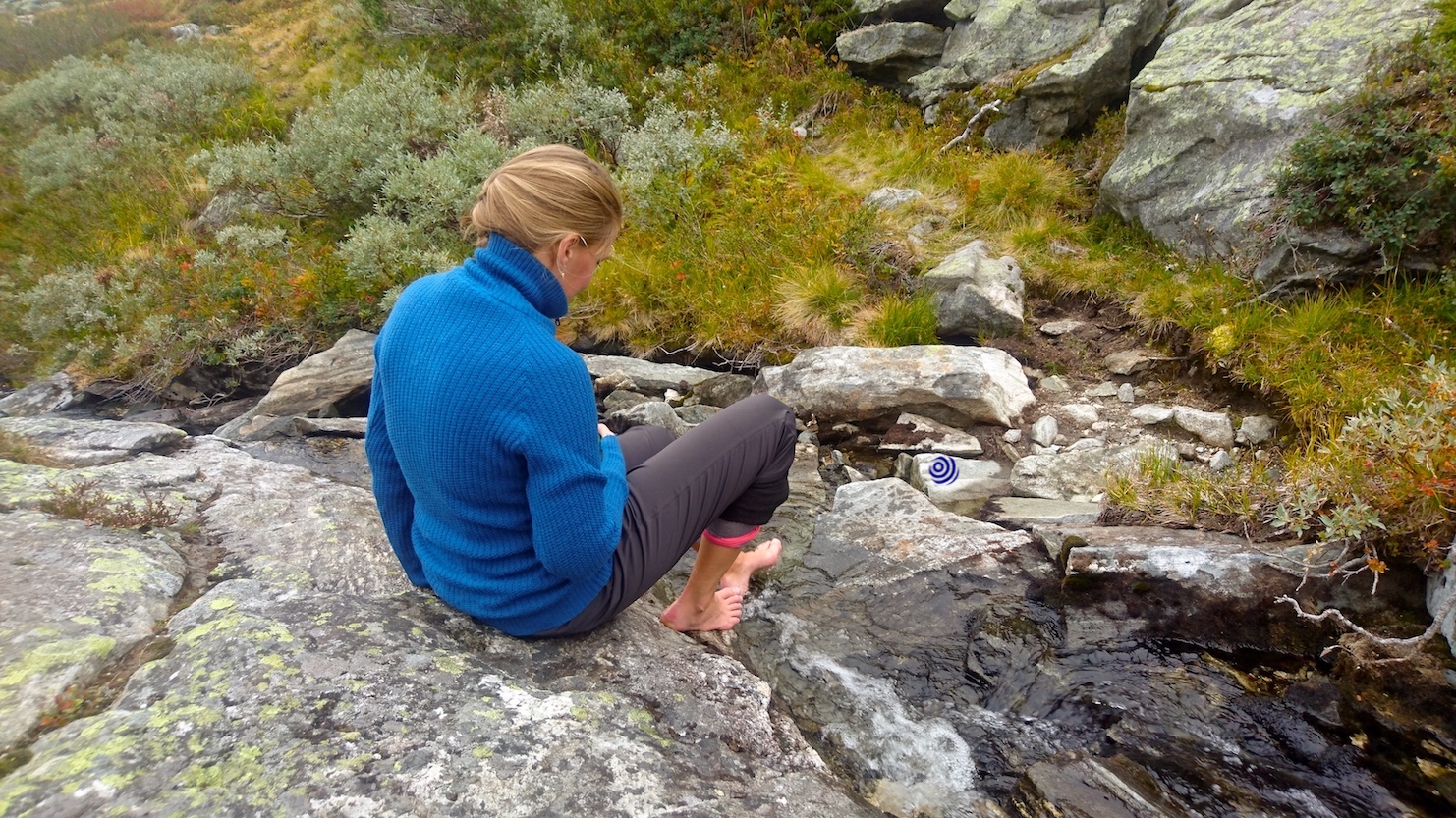 Soothing feet in a stream on a hike in Breheimen, Norway